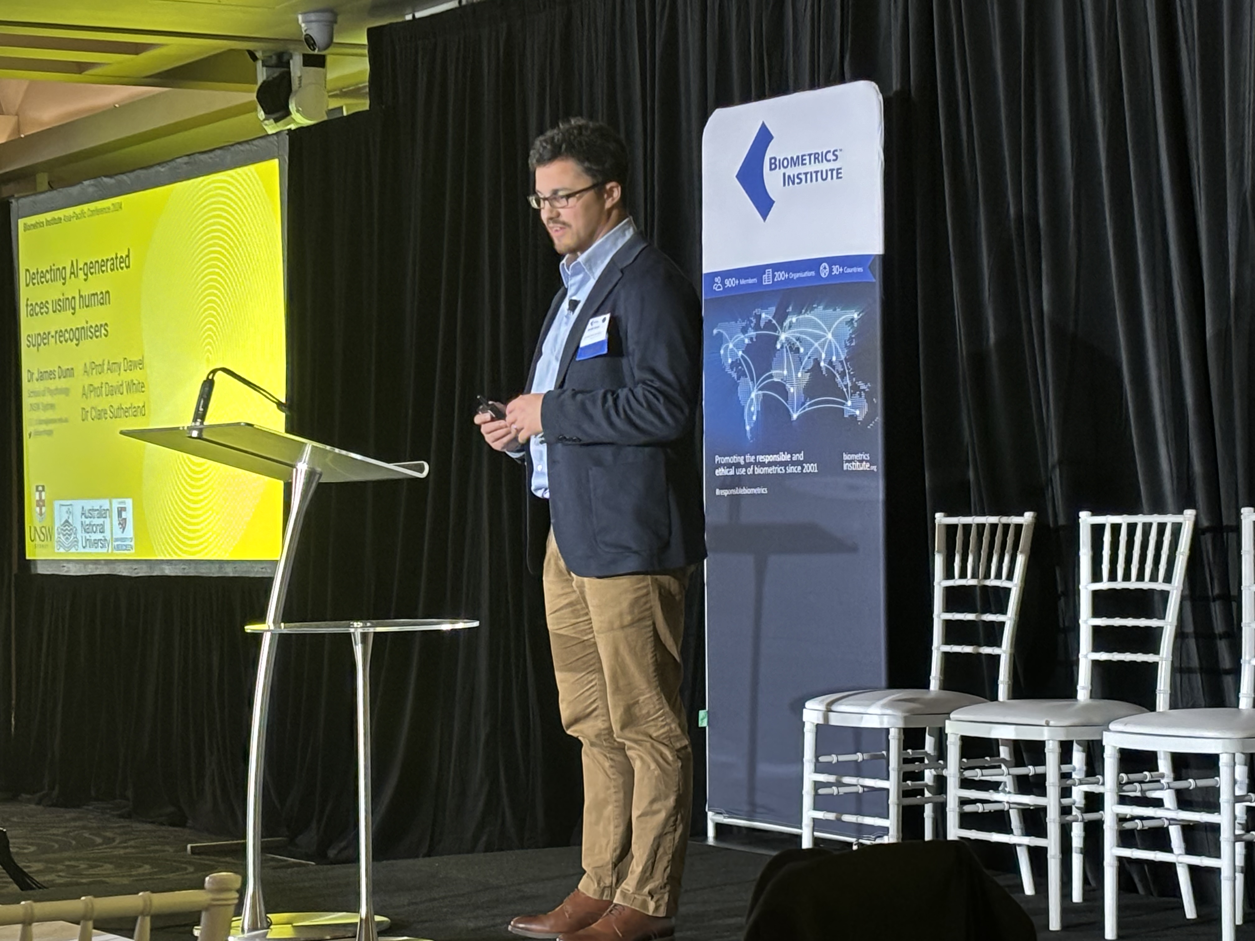 Dr James Dunn presenting to public